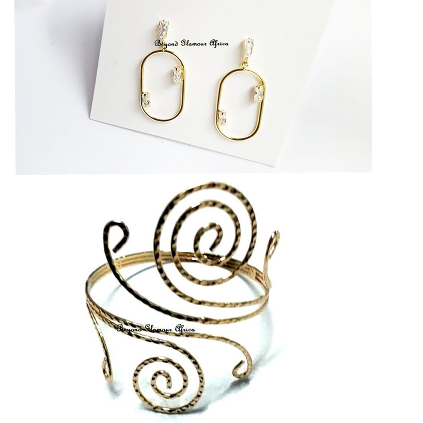 Womens Gold Tone Armlet and earrings