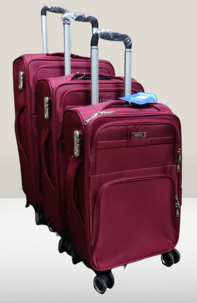 FASHIONABLE 4 PC 4 WHEEL MATERIAL TRAVELLING BAG-MAROON