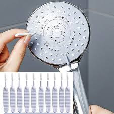 Shower head cleaning brushes