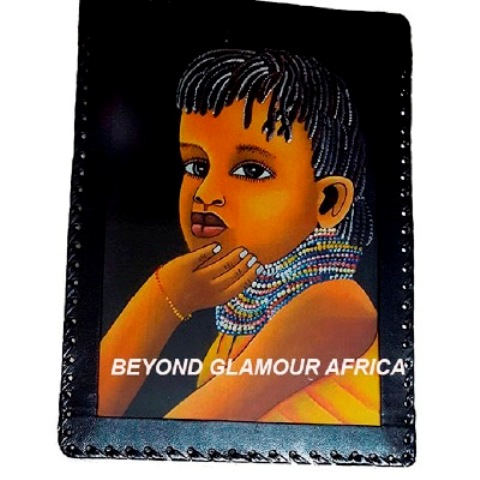 Leather bound child african art