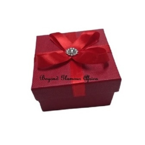 Red cardboard box with Ornamental ribbon